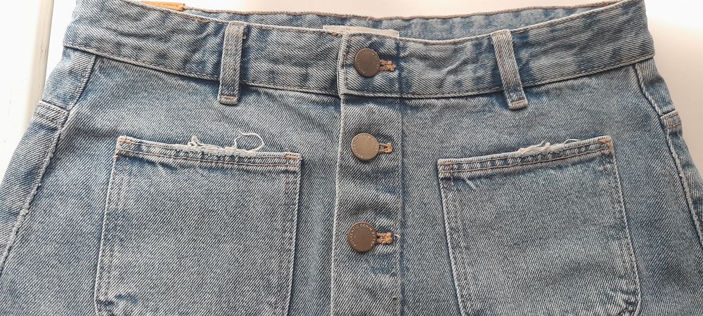 Saia de ganga botões