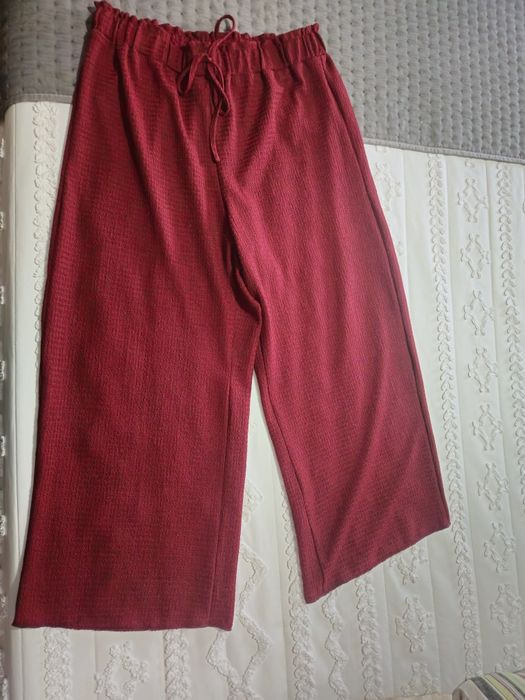 Calça pantalona.