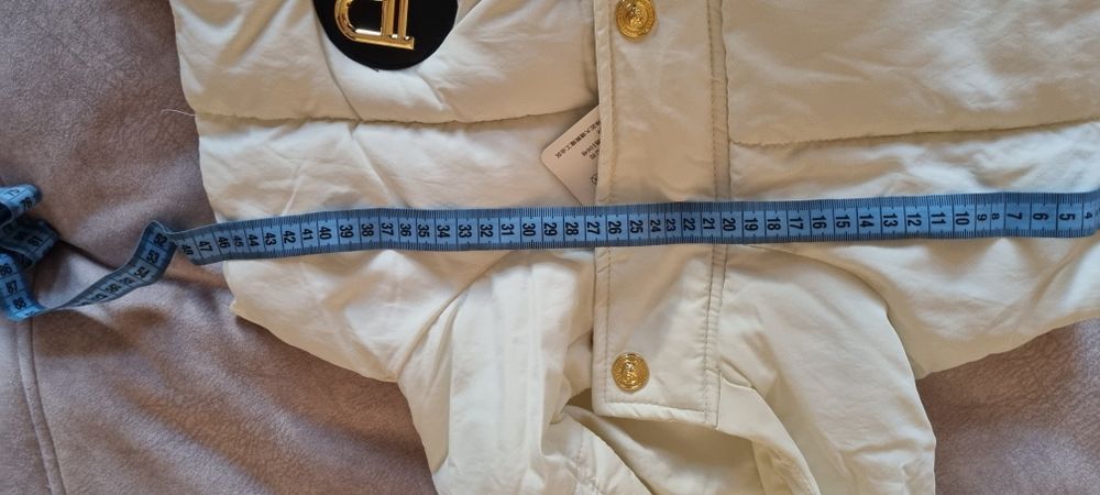 Женская жилетка .