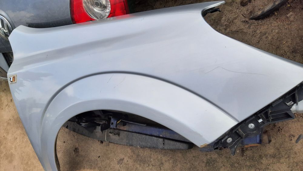 Lak. Z157 błotnik prawy przedni Opel Astra H III