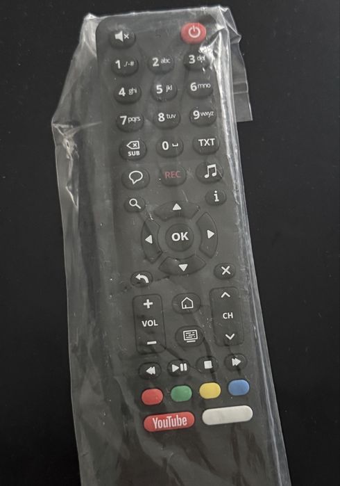 Pilot Netia Nowy zafoliowany z przyciskiem Youtube