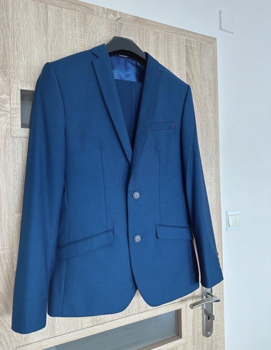 Garnitur męski młodzieżowy elegancki  granatowy  Wiliński