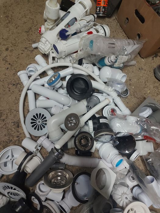 Lot of traps, elbows, drain pipes, etc.64752322941953122