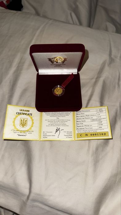 Золото монета близнюки 1,24 гр 999,9