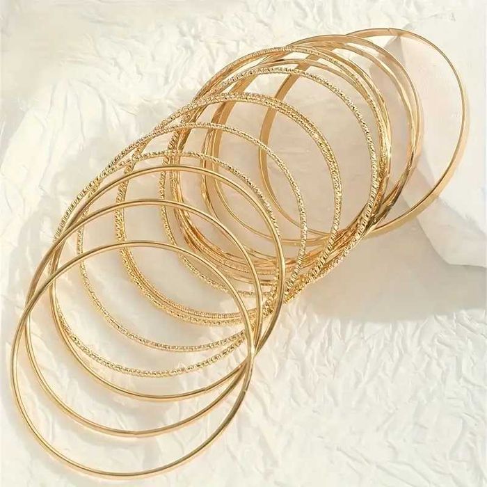 2 szt bransoletek gładkie płaskie w kolorze złotym śred. około 7cm