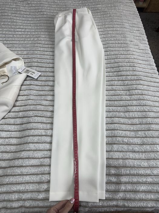 Елегантний жіночий костюм молочного кольору (піджак + штани)