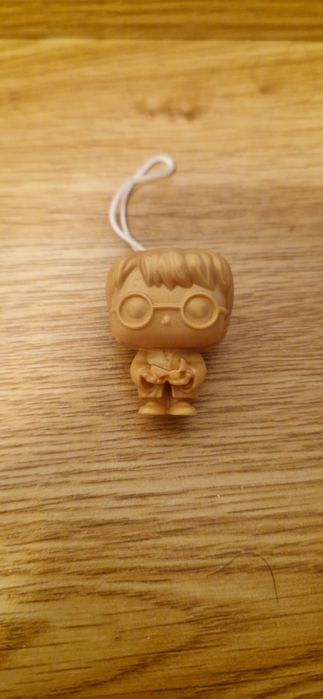 Herry Potter Dourado Novo