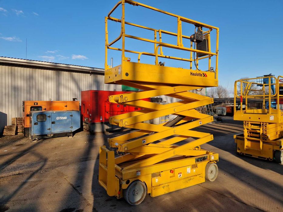 Ножничний підйомник Haulotte Compact 10N, акамуляторний, пеканіска