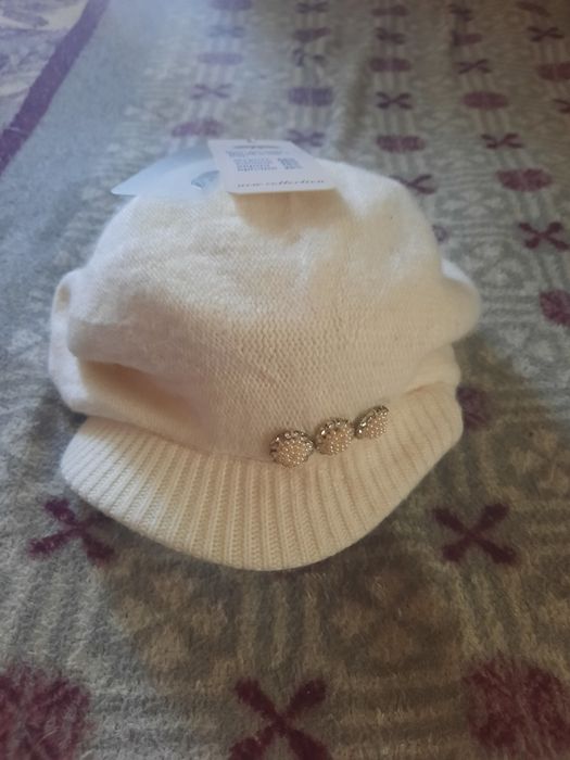 Продам  берет с казирком.