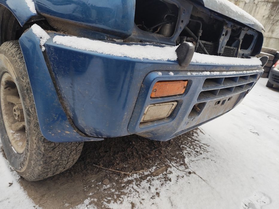 Nissan Terrano II Ford Maverick I zderzak przód przedni l