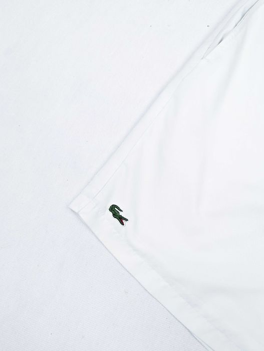 LAcoste białe spodenki M