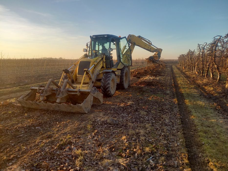 Wyrywanie sadów. Usługi koparko-ładowarką