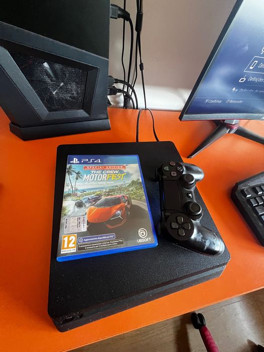 Ps4 slim 500gb usada + comando + the crew motorshowfest +Fifa17+Fifa15