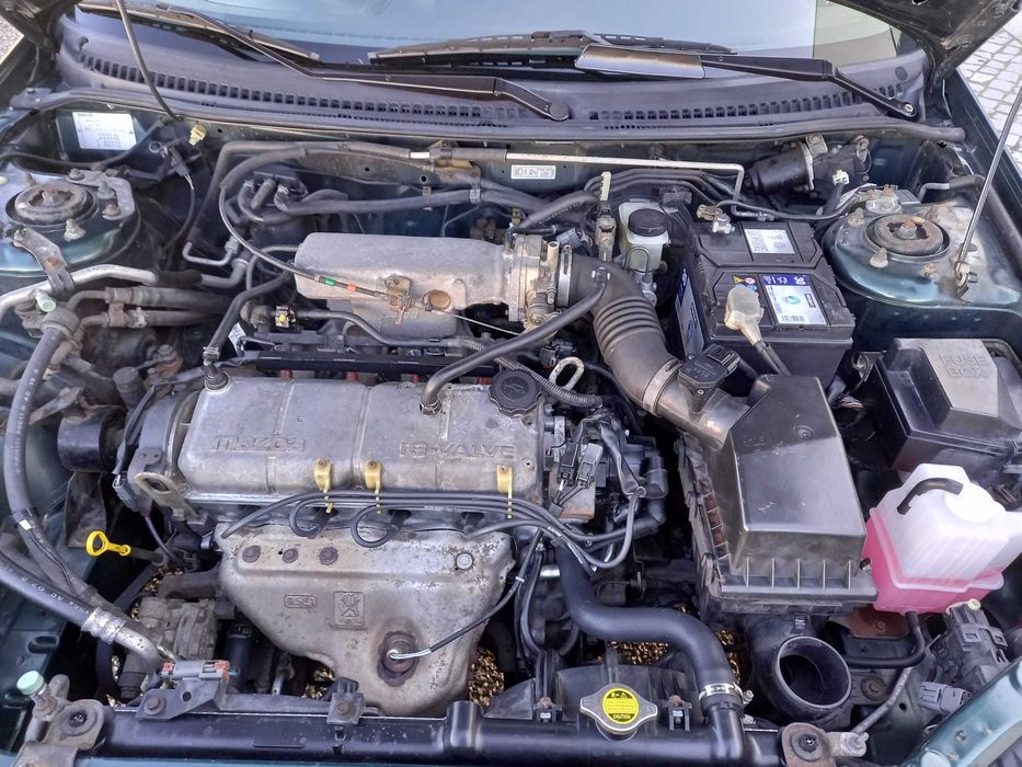 mazda 323 f bom e barato