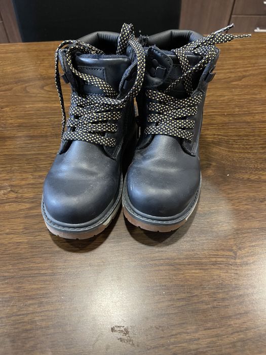 Botas marinho de menino