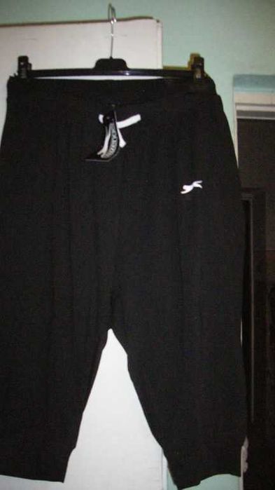 czarne nowe spodnie sportowe roz.40/42 za kolano