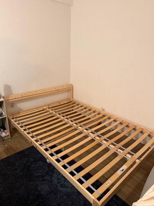 Ikea wood bed with mattress, blanket and pillows