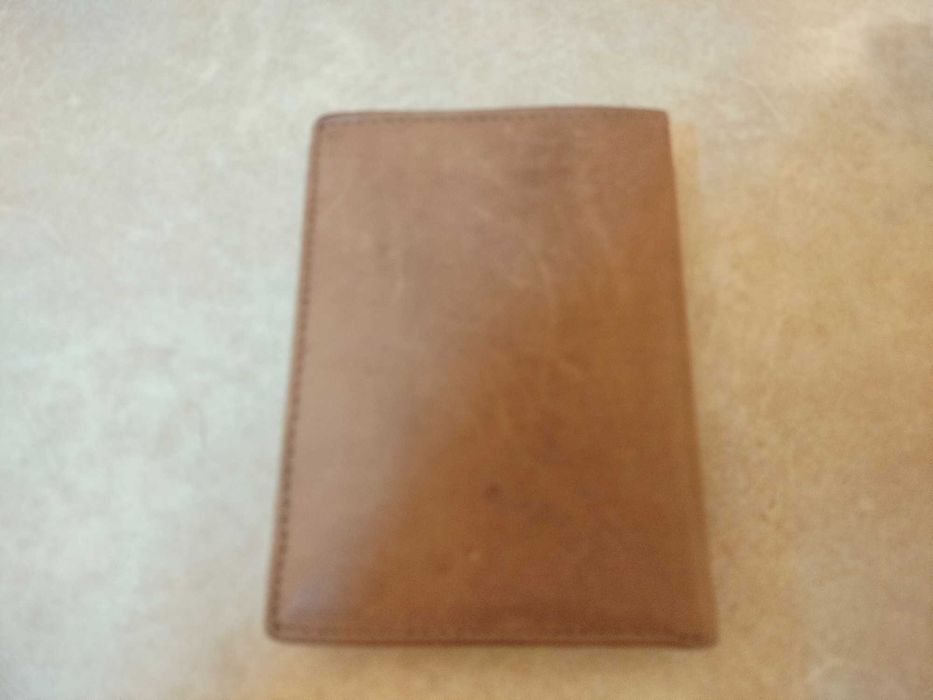 Carteira e Bolsa de pulso para homem em pele novos