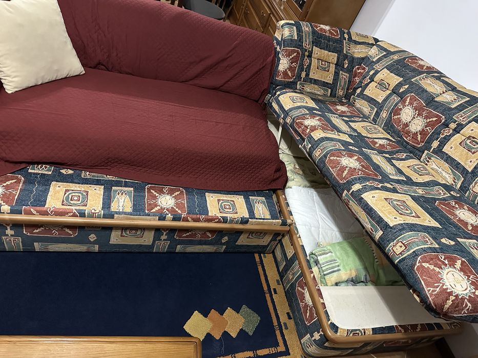 Sofá de canto com cama e arrumação + Poltrona