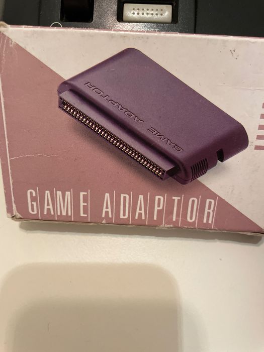 Sega Mega Drive with Game and Adapter64171299369473122