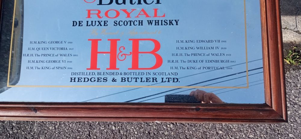 Espelho publicitário de whisky