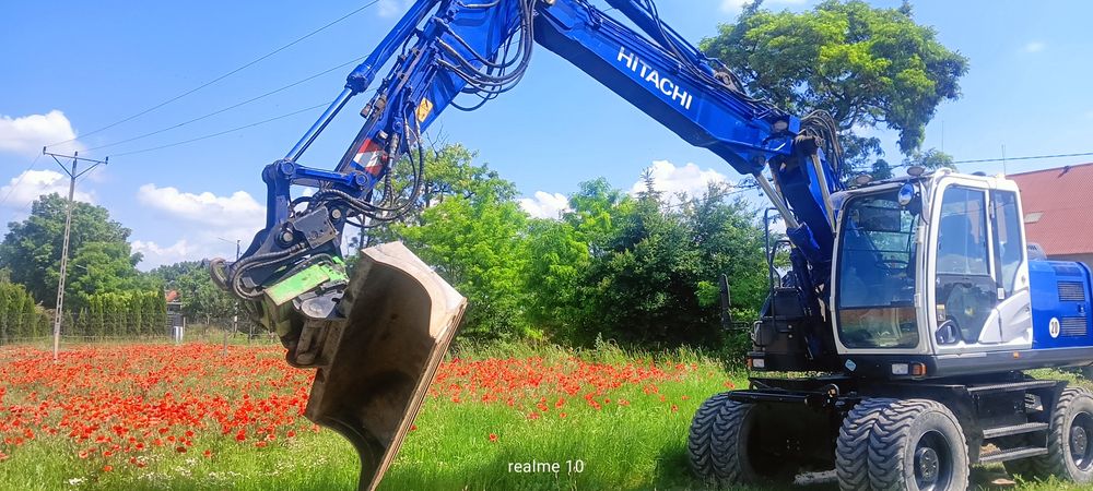 Sprzedam koparkę kołową Hitachi ZX 140 W-5B