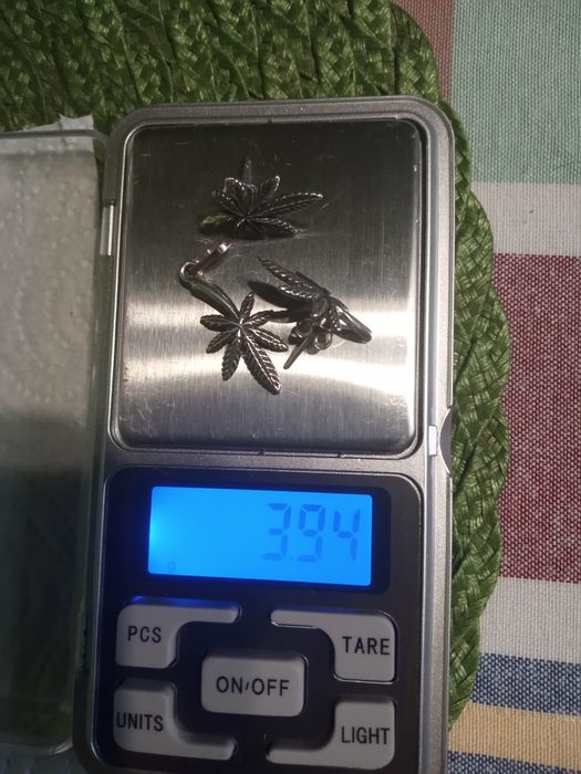 Srebrny komplet z listkiem.