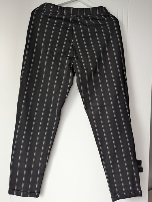 Spodnie materiałowe Reserved