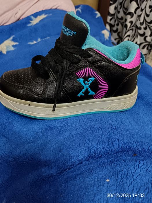 Кросівки - ролики. Кросівки з колесом