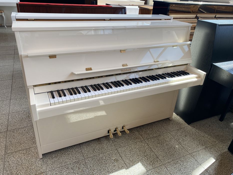 Piękne, białe pianino Weinbach