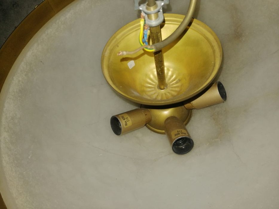 Candeeiro de pedra com dourado
