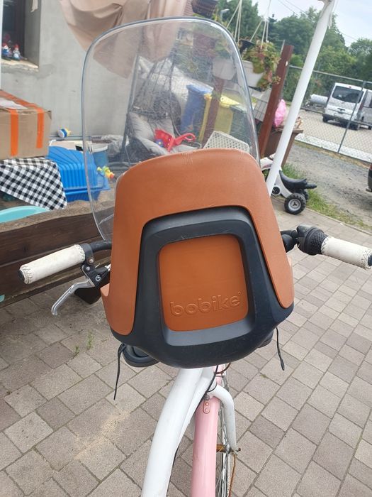 Fotelik rowerowy na kierownice z szybką ochronna  bobike