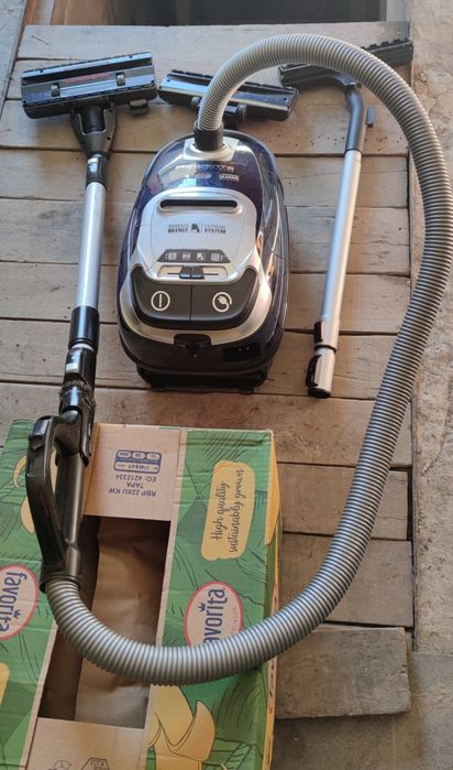 Пилосос,Ровента.