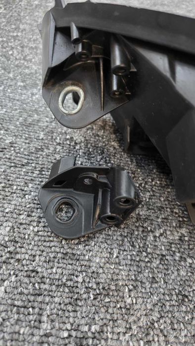 Uchwyt reperaturka mocowania lampy Fiat Bravo II NOWE boczne