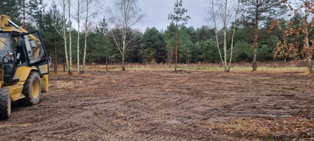 Usługi Koparko-ładowarka koparka  niwelacja pracę ziemne wykopy