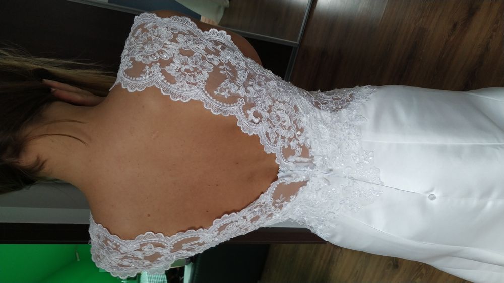 Elegancka suknia ślubna r. 36