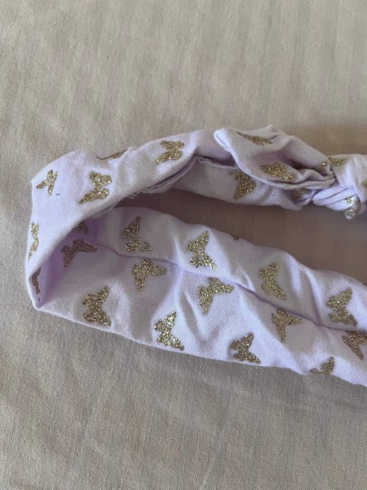 Bandolete de tecido lilás com borboletas douradas Kiabi, tamanho único