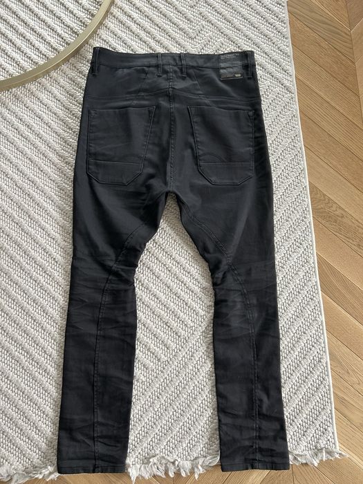 Jeansy męskie powlekane Jack & Jones woskowane czarne anti fit dan
