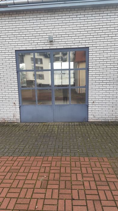 Bramy garażowe stalowe z ciepłą szybą