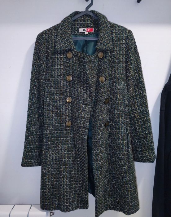 Casaco comprido .