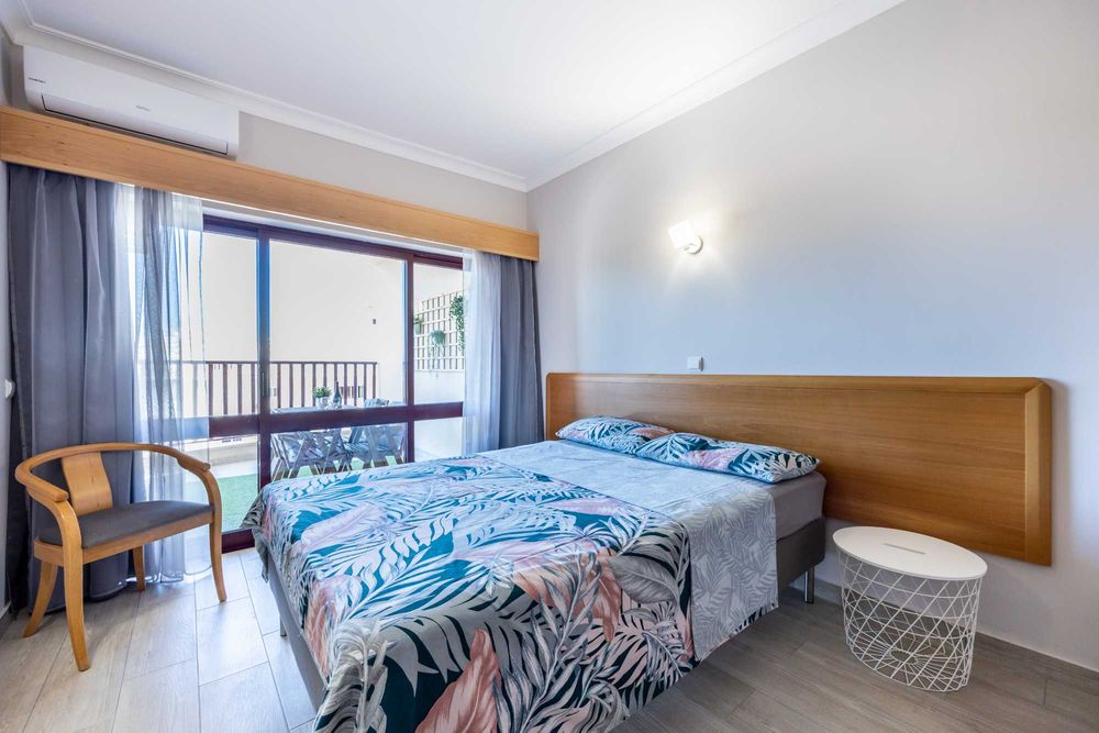 A 250 metros da praia - Magnífico T1 férias Praia da Rocha - AC, Piscina, Terraço, TV Cabo, WIFI e Garagem