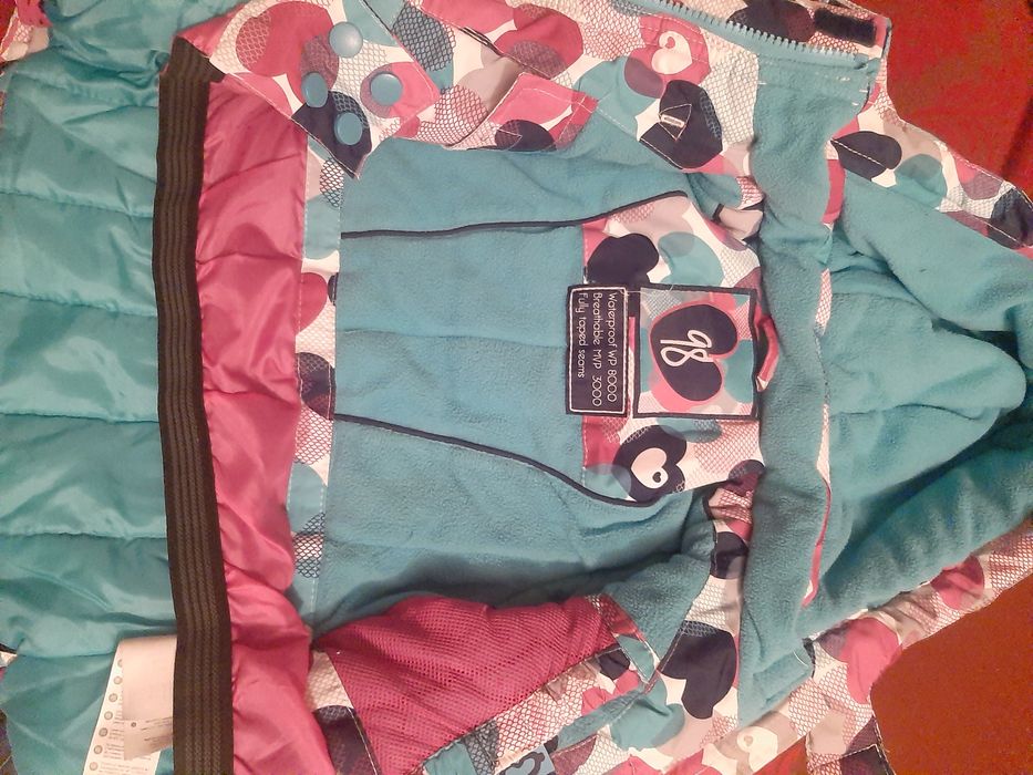 Дитячі, зимові комбінезони.