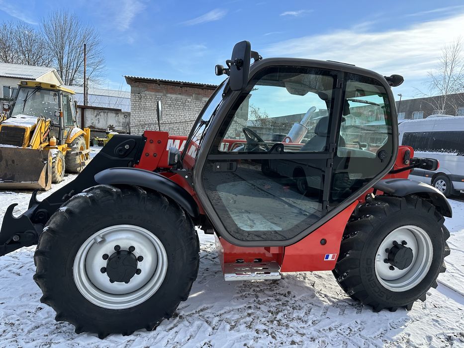 Телескопічний навантажувач маніту Manitou