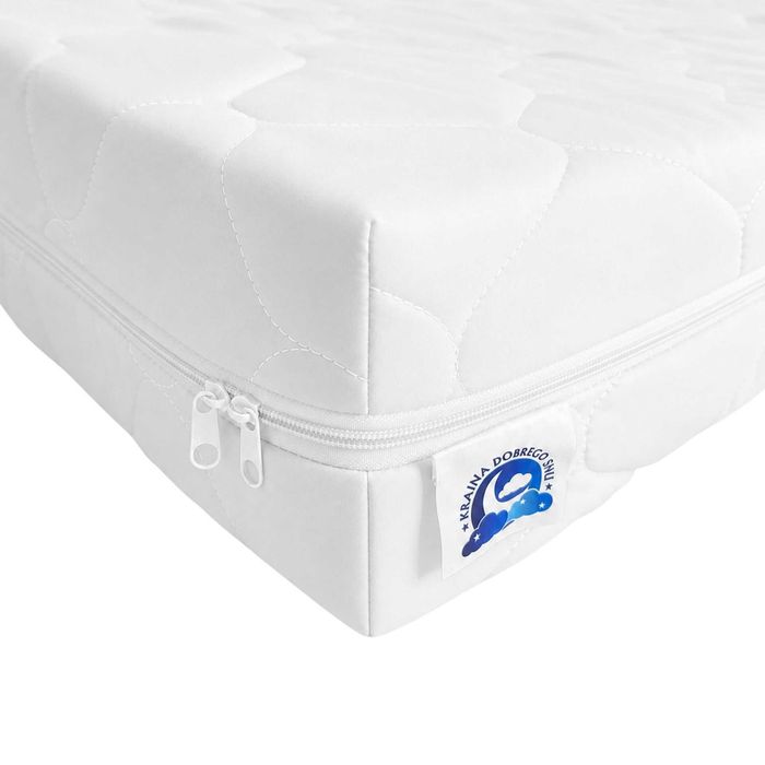 Pikowany pokrowiec na materac z gumami KRAINA DOBREGO SNU 140x200 wys. 2-11 cm
