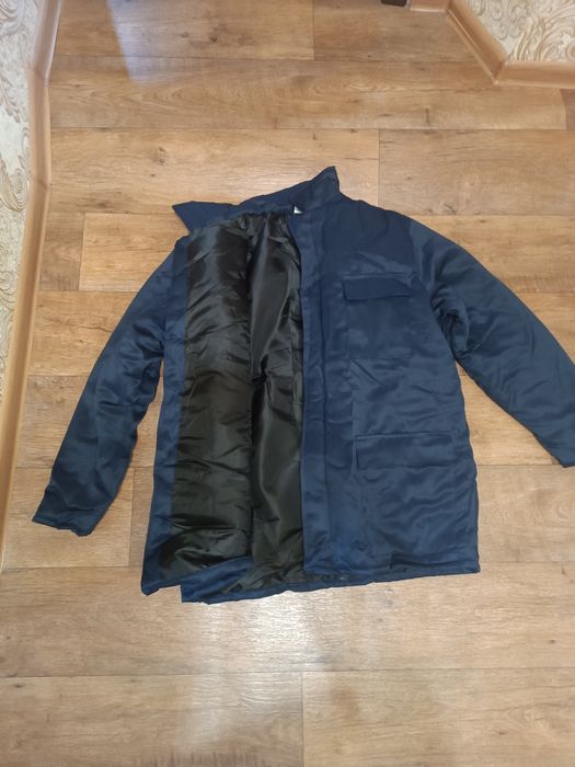 Продам рабочий мужской комбинезон теплый.