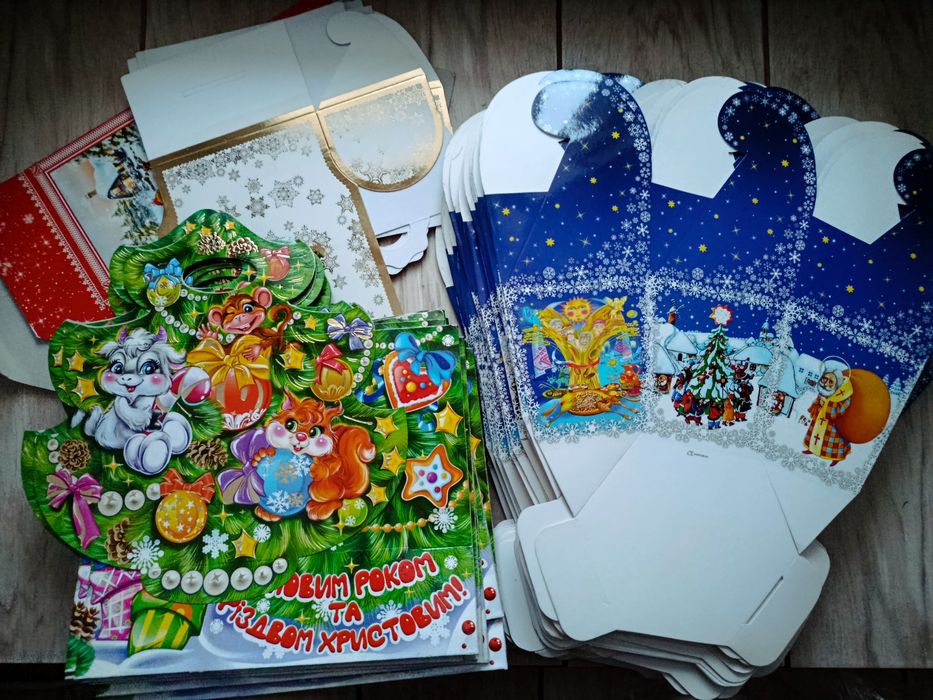 Новорічні упаковки та подарункові пакети, нові (залишки)