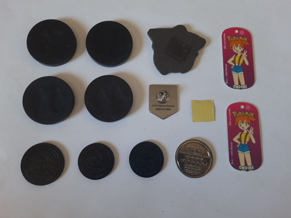 Artigos Pokemon variados (tazos, coins, outros)