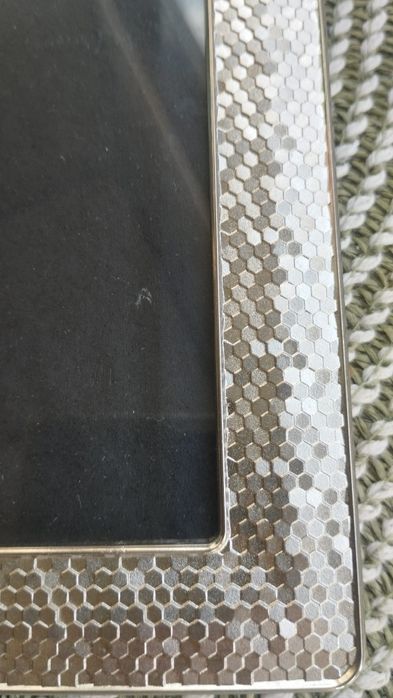 Moldura muito bonita e elegante. Aproximadamente 23 cm de altura. €9