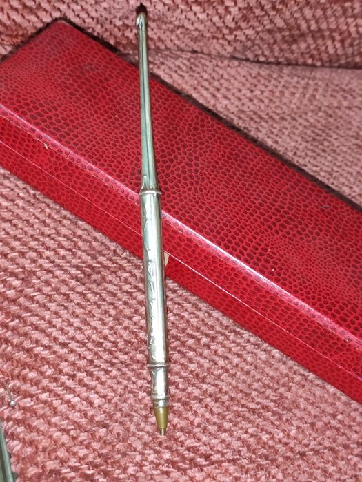 Agenda telefónica, esferográfica, pega de carimbo