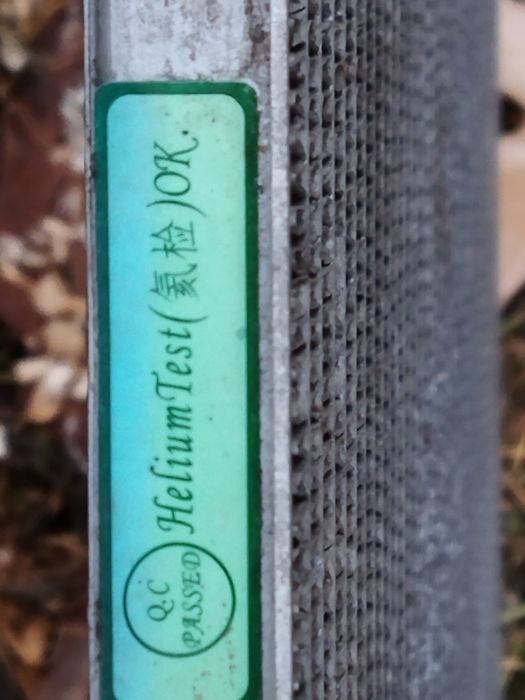 Радіатор кондиціонера Ніссан Жук